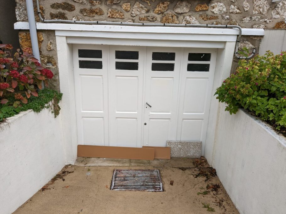 Porte de garage enroulable avant / après