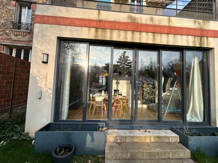 Baie vitrée alu anthracite avant / après
